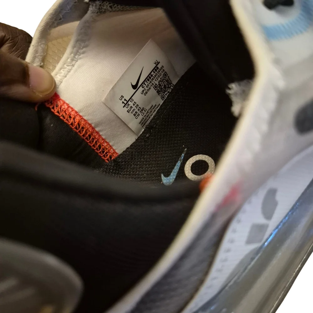 Nike Silver and‎ Black Athletic Shoes Sleek Design